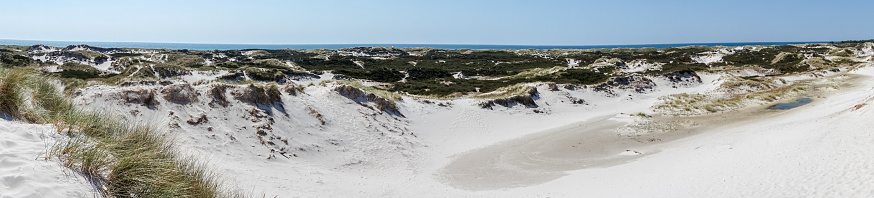 Idyllic sand dunes in Bornholm, Denmark on a day in summer