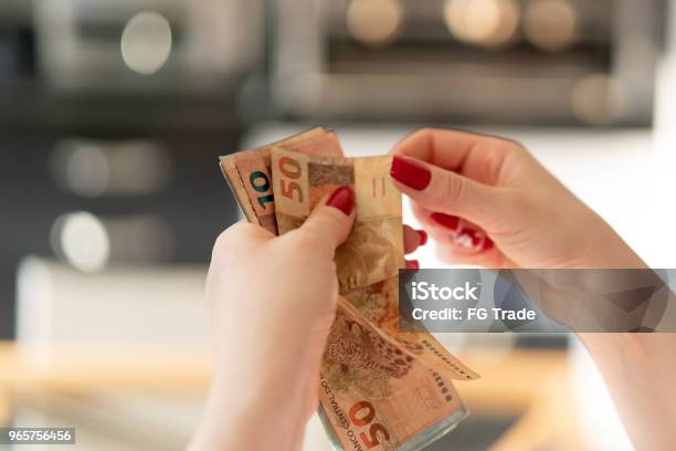 Woman Hand Holding A The Currency Of Reais Brazilian Money Stock Photo - Download Image Now