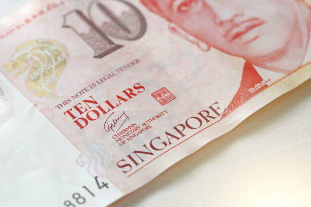 istock Ten Singapore Dollars With One Note. 10 Dollars 965771264