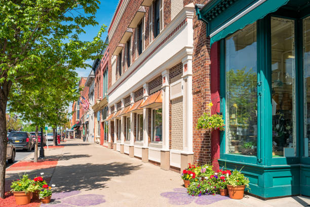 Downtown Seneca Falls Finger Lakes region New York State USA Stock photograph of businesses in downtown Seneca Falls, Finger Lakes region, upstate New York State, USA on a sunny day. sidewalk stock pictures, royalty-free photos & images
