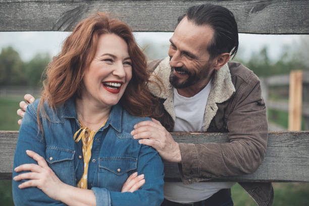 istock Joyful loving couple embracing in the nature 965793378