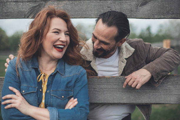 istock Cheerful lovers flirting and smiling outdoor 965793438