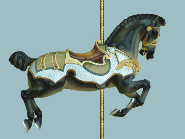 A dark black and brown carousel horse ride for children styled with antique retro styled medieval saddle and bridal and armor with gold, green and blue colors and a gold pole, isolated on a blue background.