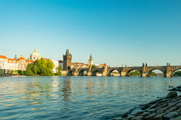 istock Prague, Charles Bridge and tower by the River 965824984