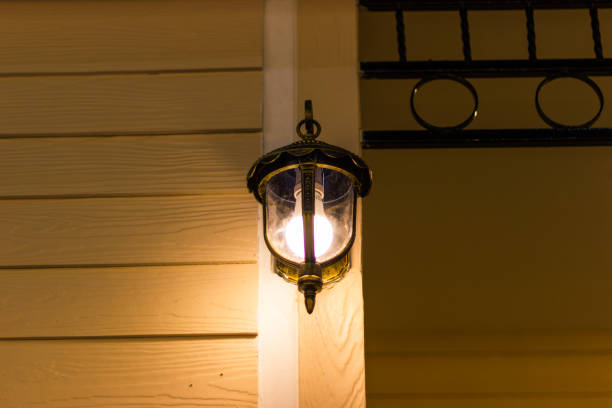 istock Vintage style lantern lamp decorated hang on the brick wall background. 965826194