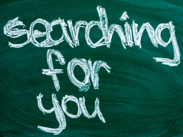 istock searching for you text on blackboard isolated 965846870
