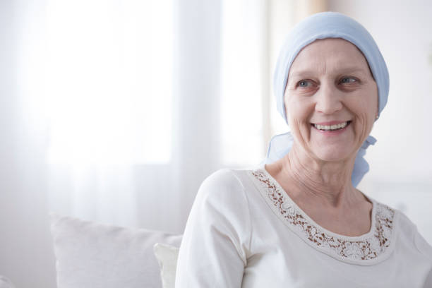 happy and hopeful cancer patient - cancer chemotherapy drug patient women imagens e fotografias de stock