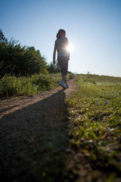 istock Early morning jogging on footpath 965880696