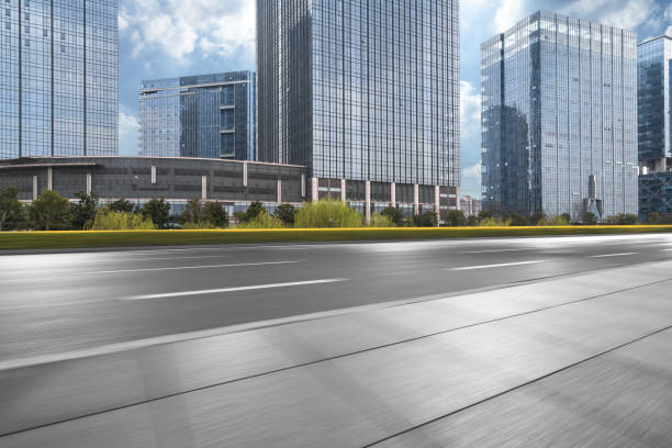 istock blurred Asphalt road of modern city,china 965885148