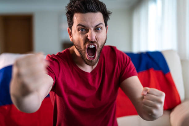 istock Russian fan celebrating at home 965890802