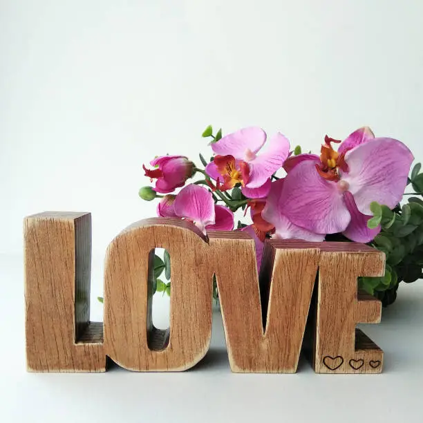 Word love in wood made by me in an artisanal way