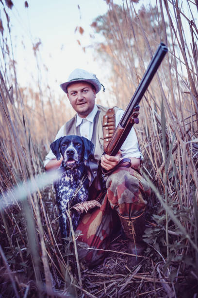 istock Hunter And His Hound Proud Of Their Experience 965943674