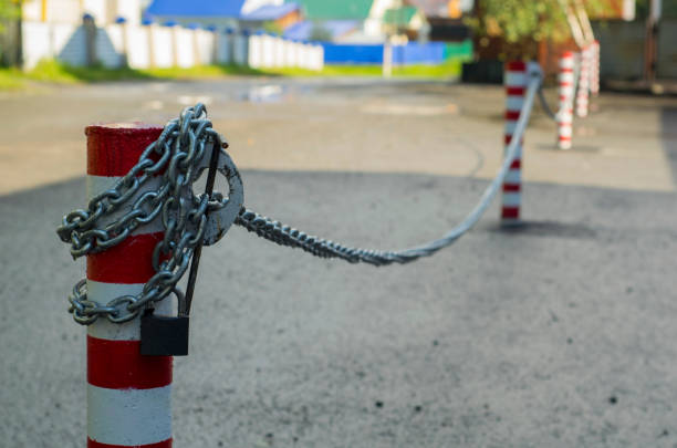 istock pole fencing with chain and lock 965956596