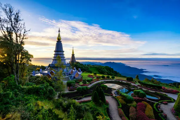 Photo of Sunrise scence of two pagoda on the top of Inthanon mountain in doi Inthanon national park, Chiang Mai, Thailand.