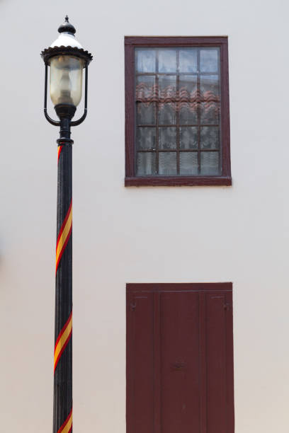 istock A street light with houe a window and door in the back. 965979708