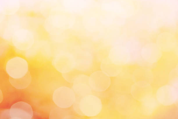 istock orange color abstract background with blurred defocus bokeh light for template 965988854
