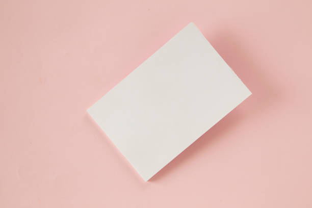 istock Blank business card on pink background 965991614