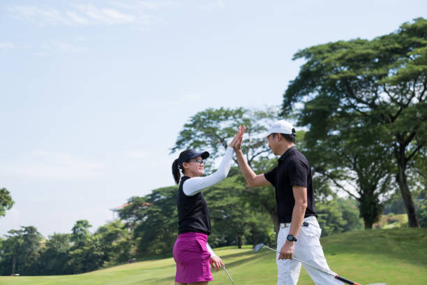 istock High 5 after that game of golf 966004028