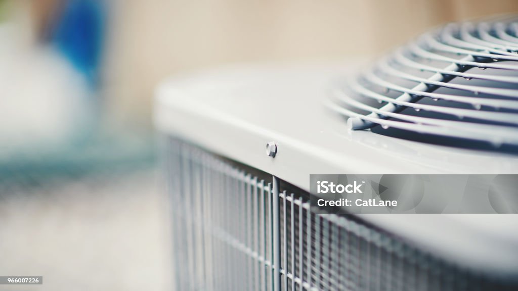 Air conditioner unit in residential garden Air Conditioner Stock Photo