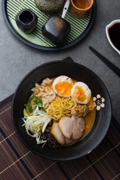 istock japanese spicy miso ramen noodles with pork belly and marinated egg 966032316