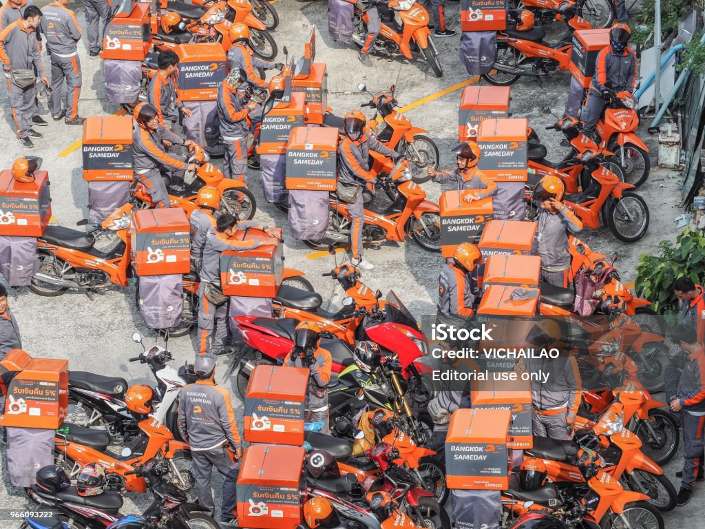 Kerry logistic. Officials with shipment as parcel transport motor. BANGKOK, THAILAND - MAY 31,2018: Kerry logistic. Officials with shipment as parcel transport motor. Kerry is the parcel delivery quick and convenient domestic Thailand greatly. Biker Stock Photo