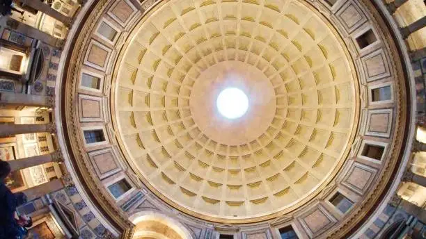 Pantheon is a former Roman temple, now a church, in Rome, Italy.
The height to the oculus and the diameter of the interior circle are the same, 142 feet (43 m).
The ceiling ocolus let the sun light various areas inside Pantheon 2000 years before we invented the spotlight
Romans used a precise day of the year and hour and placed the emperor on sun spotlight in front of the crowd