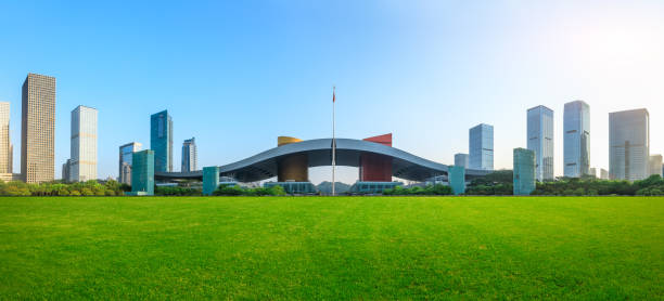 istock Green grass and modern city skyline scenery in Shenzhen 966122876
