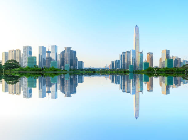 istock Modern city skyline and water reflection in Shenzhen at sunrise 966128196