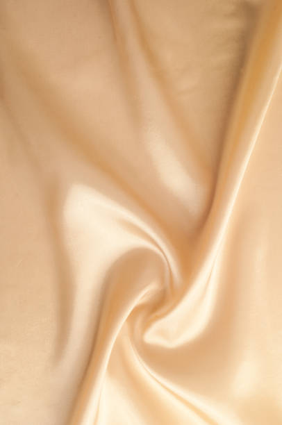 istock Texture background of fabric. Beige fabric. Silk fabric wallpaper texture background pattern in sepia pastel yellow cream beige tint: Lovely natural silk textured textile 966142272