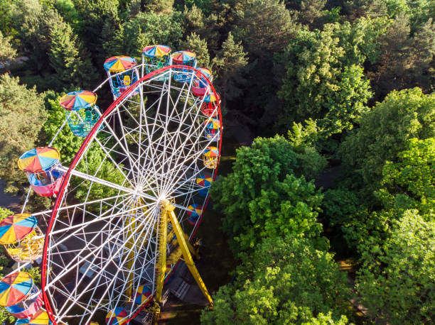 istock ferris wheel in public park at summer morning 966143700