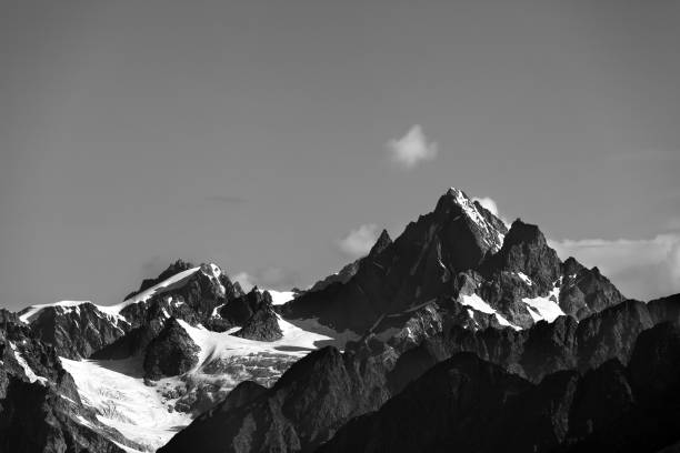 istock High mountains with snow at summer 966156040