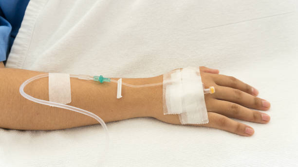 istock Woman patients on the bed have injection saline 966159680