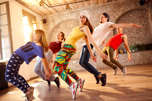 istock Group of dancers dancing together 966172944