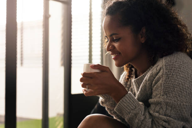 istock Woman having a warm cup of coffee 966179606