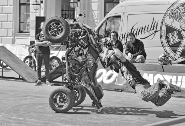 Lviv, Ukraine - June 7, 2015: Unknown stunt bikers  entertain the audience before the start of the championship of drifting near Arena - Lviv stadium in Lviv, Ukraine.
