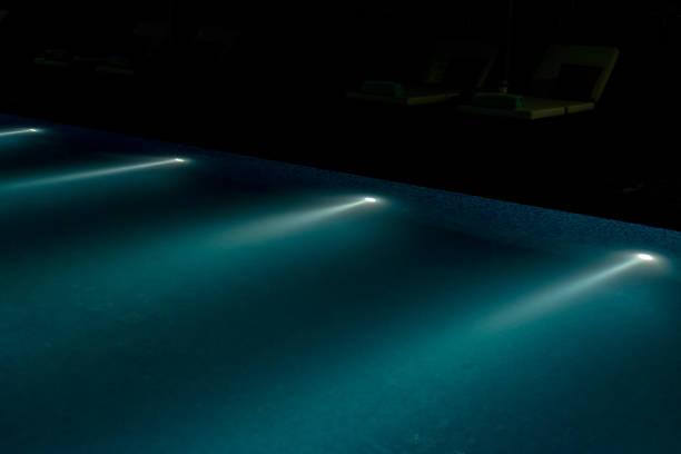 lighting fittings under water in swimming pool at nightlighting fittings under water in swimming pool at night