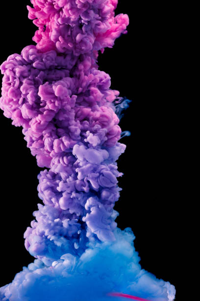 istock Blue and red paint splash isolated on black background 966187844