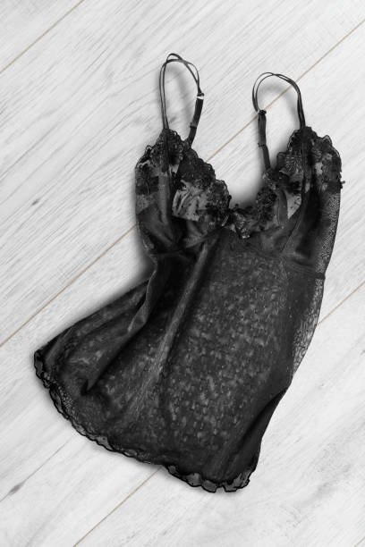 istock Lingerie top on wooden background 966187884