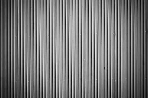 istock Black and white corrugated metal sheet wall, Backgrounds 966189186