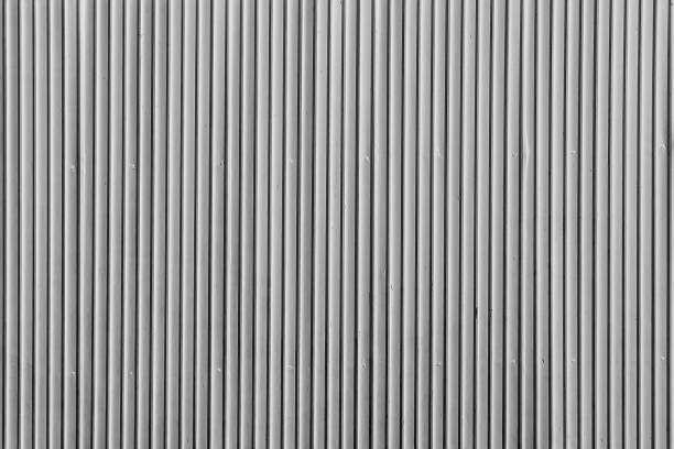 istock Black and white corrugated metal sheet wall, Backgrounds 966189250