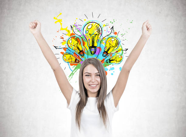 istock Happy young woman with hands in the air, creative 966204478