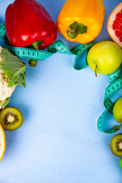 istock Food for  diet and dumbbells 966209900