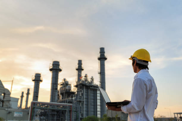 istock Engineer is checking gas turbine electric power plant by notebook 966210098