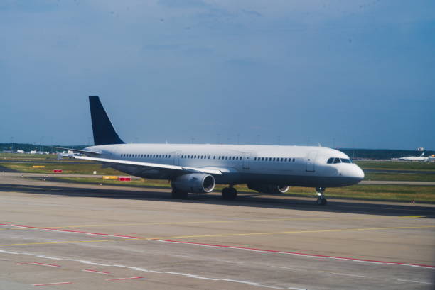 istock closeup of an airplane on the runway 966210608