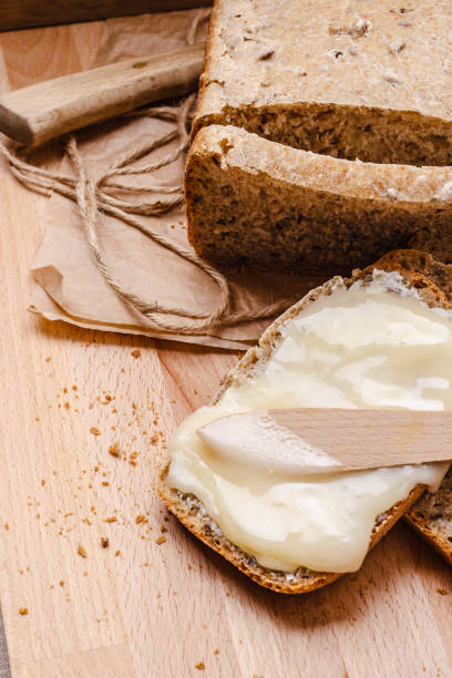 istock Still life fresh bread with butter and honey 966220318