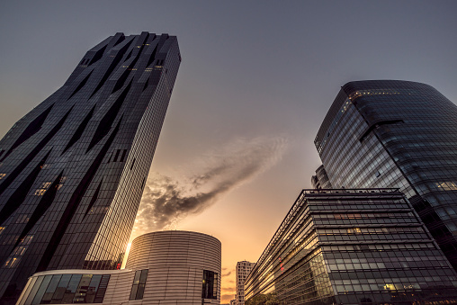 Skyscrapers in Vienna Austria in the Donaucity near the Unocity in the evening sun.