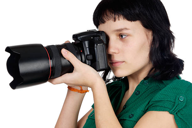 istock Woman holding a photo camera 96622468