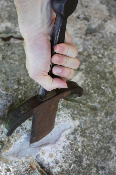 istock knight removes the sword Excalibur from the stone 966238540
