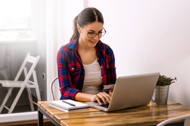 istock Casual style girl doing some web shopping 966247398