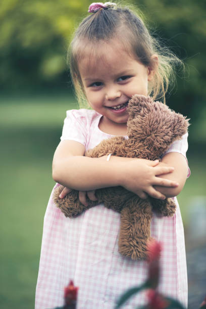 istock Girl with a toy 966262000